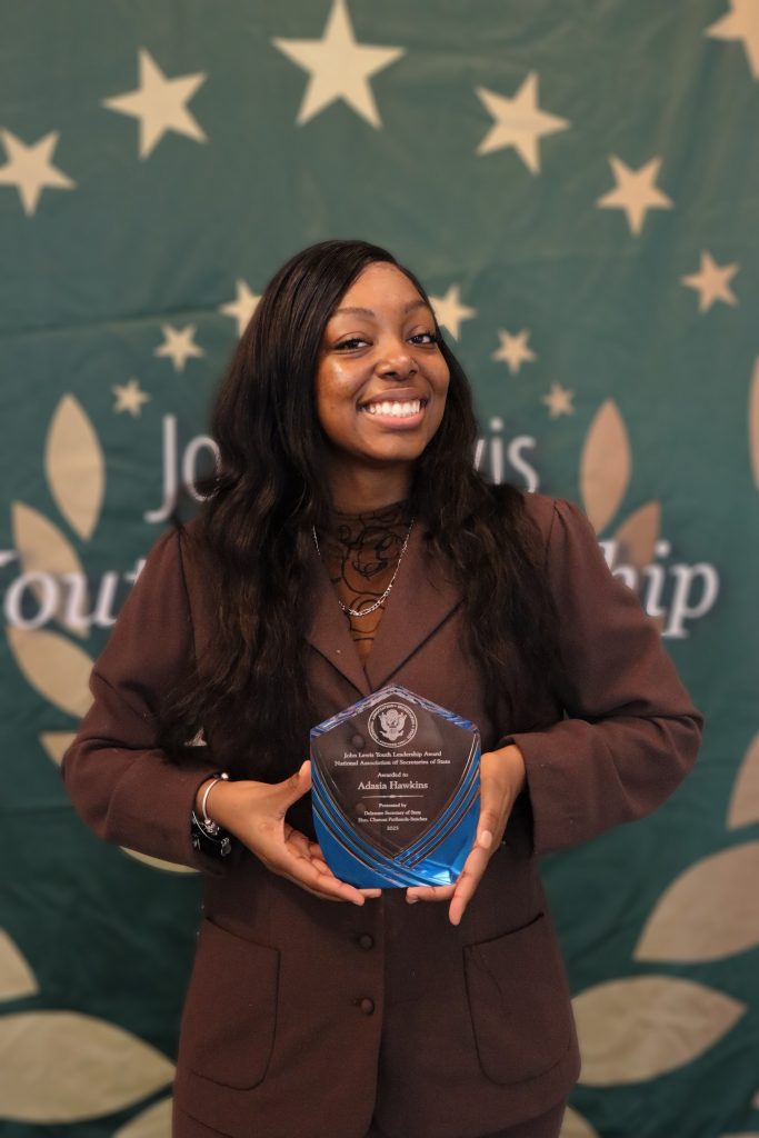 Adasia Hawkins with John Lewis Youth Leadership Award.